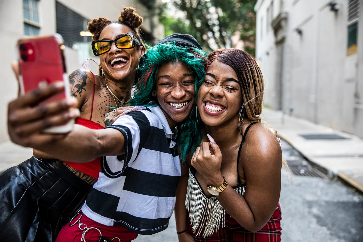 Young women taking a selfie in urban area