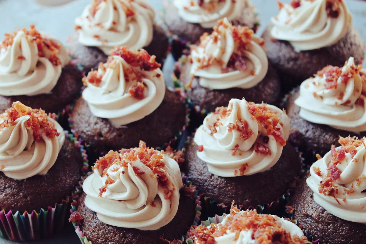 Pumpkin stout cupcakes made with an Imperial Coffee Stout, maple cream cheese frosting and peppered bacon sprinkles