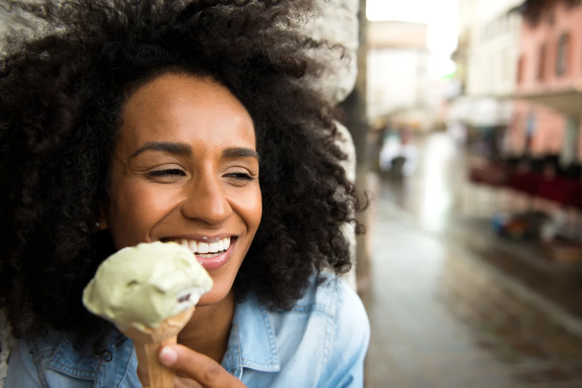 woman eating an ice cream cone