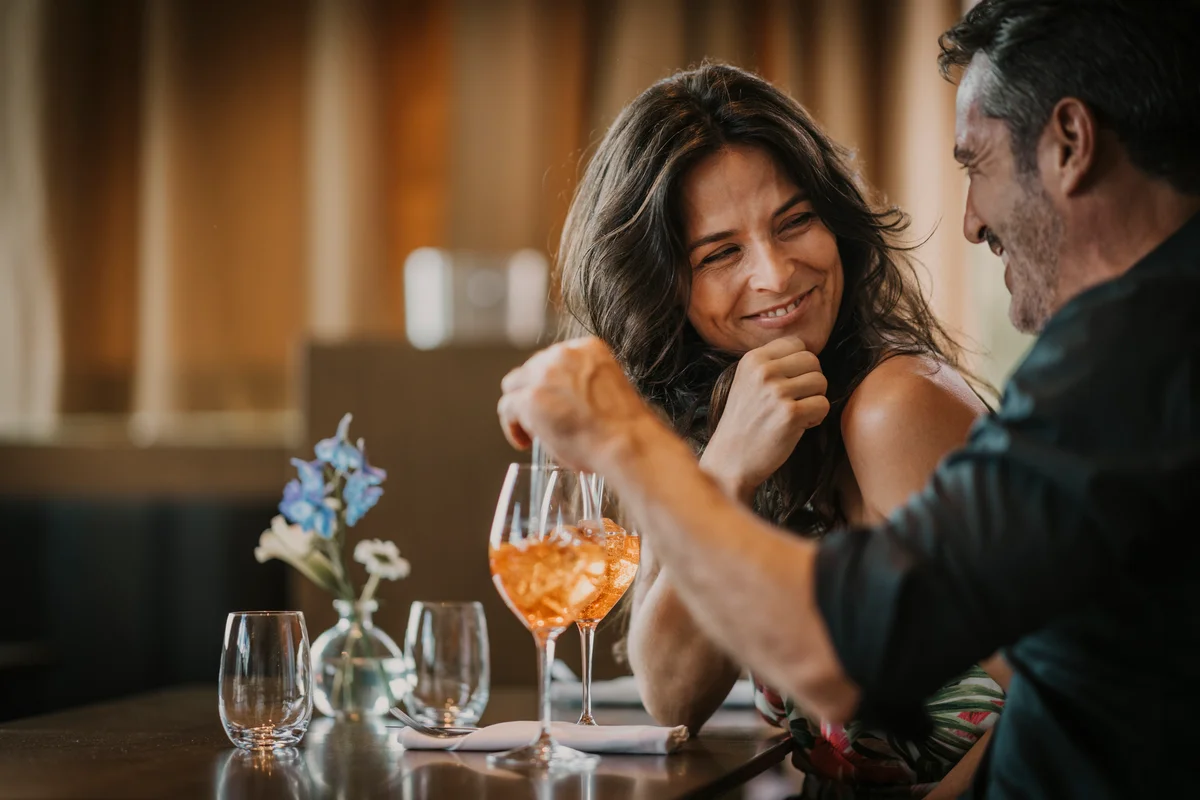 man and woman in a bar