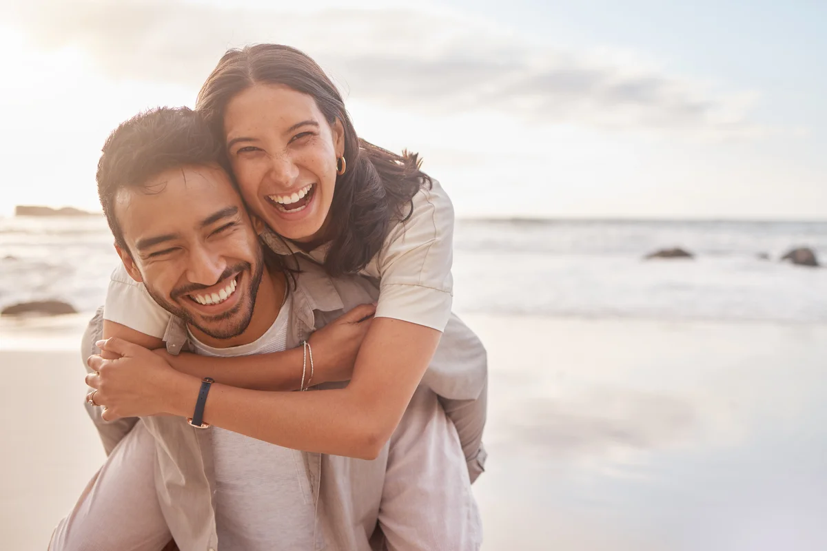 fun couple at the beach