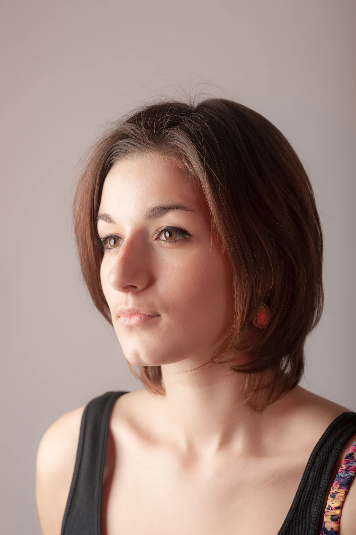 Woman with "Rachel" hair cut, long layered bob