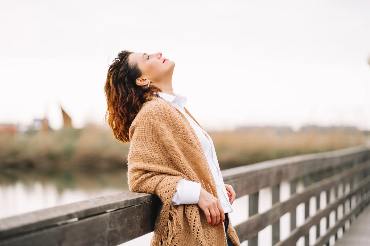 woman breathing fresh air