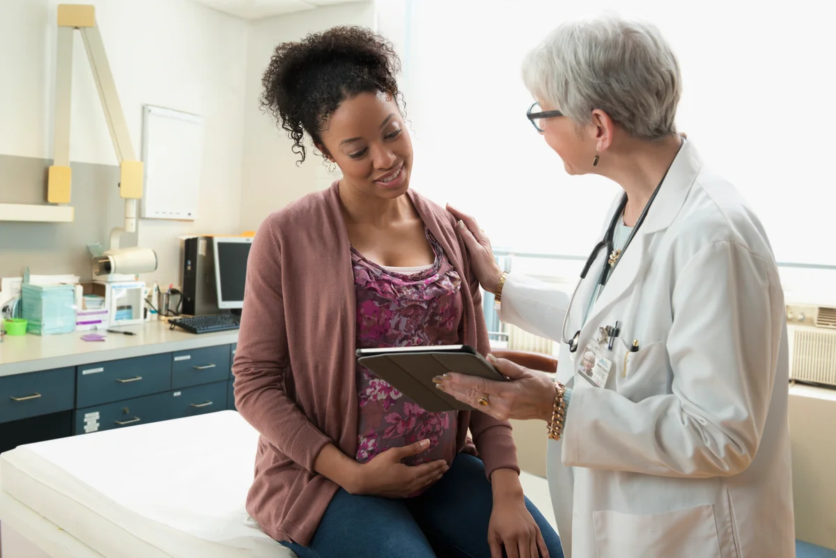 Pregnancy woman visiting her doctor