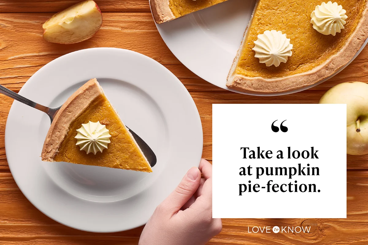 Woman holding a piece of pumpkin pie with whipped cream
