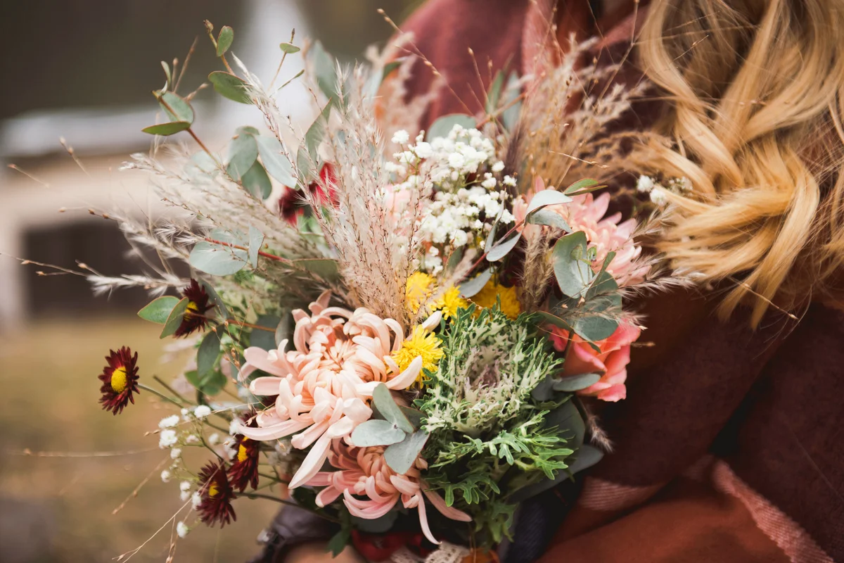 Woman holding Autumn bouquet