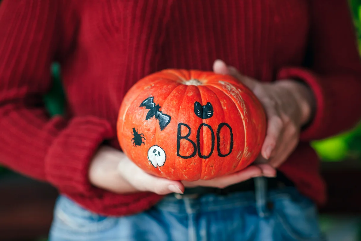 Pumpkin in woman's hands