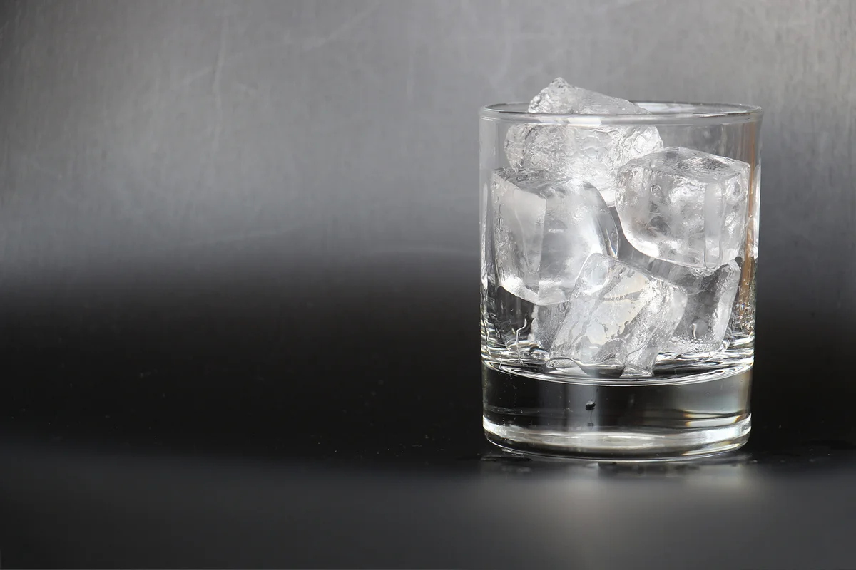 Shot of a glass with ice cubes