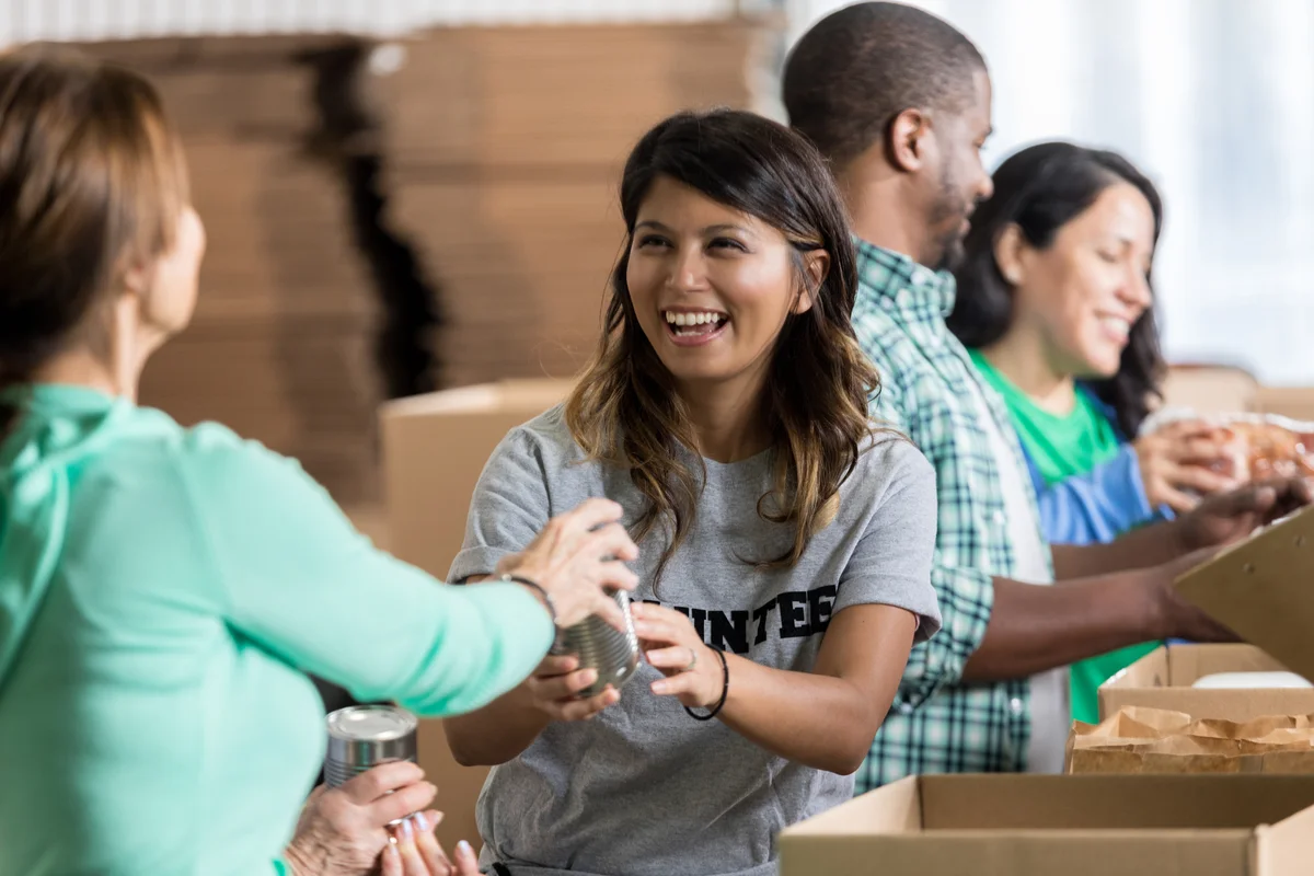 Happy volunteers working together
