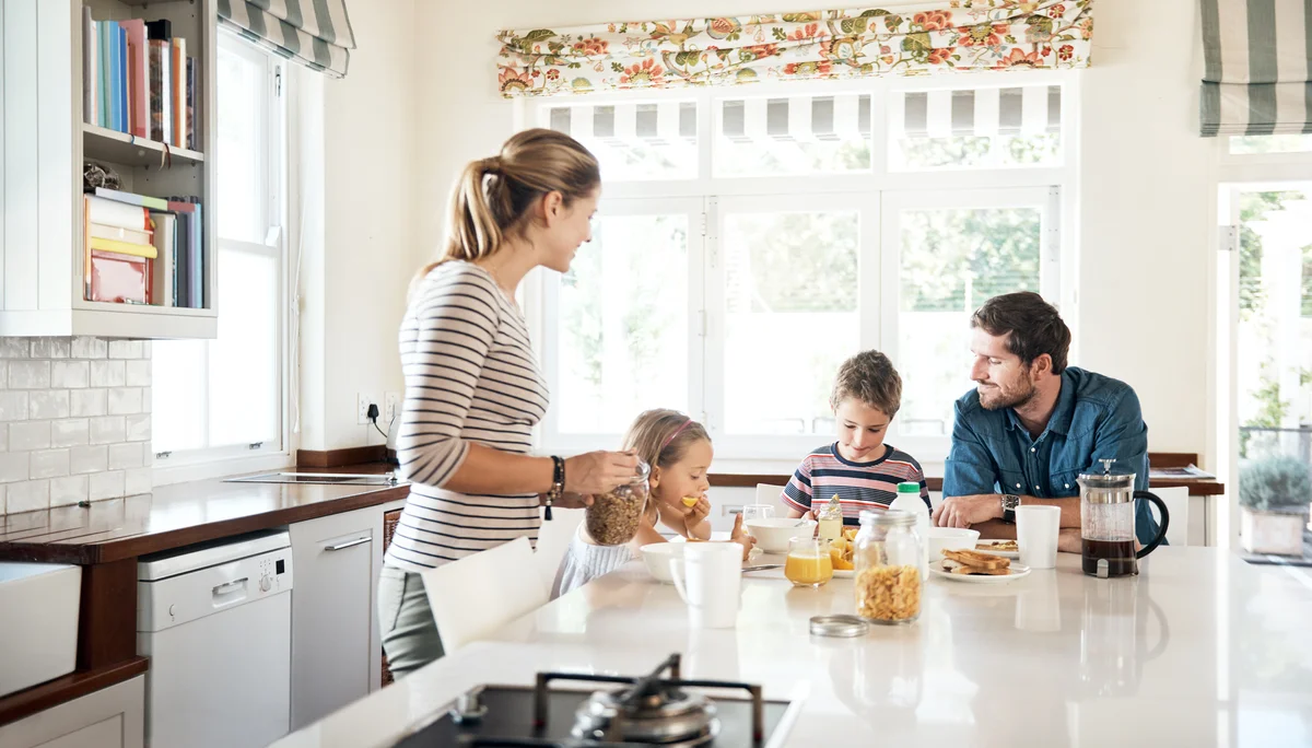 Family eating cereal for breakfast