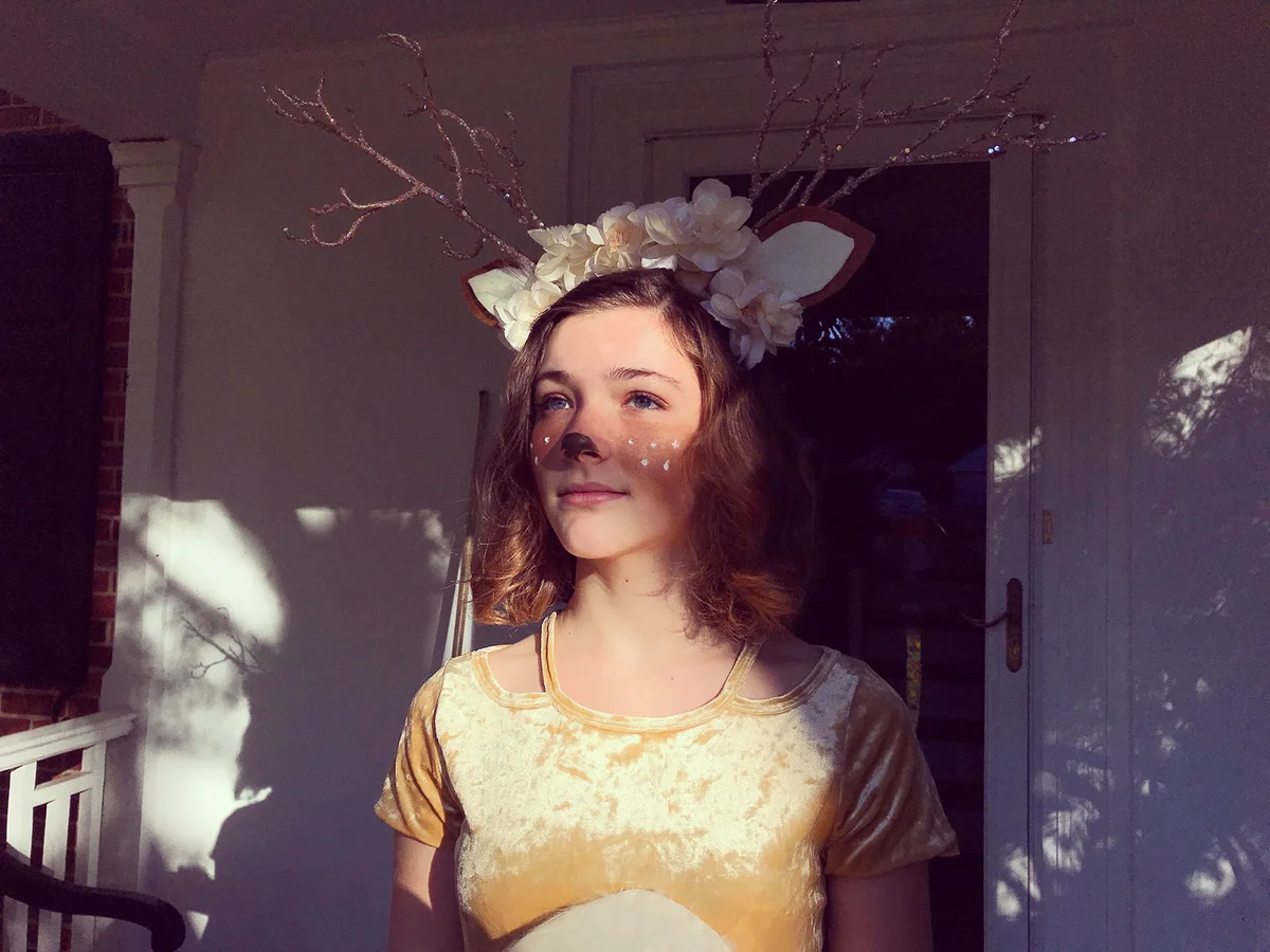 girl in deer halloween costume