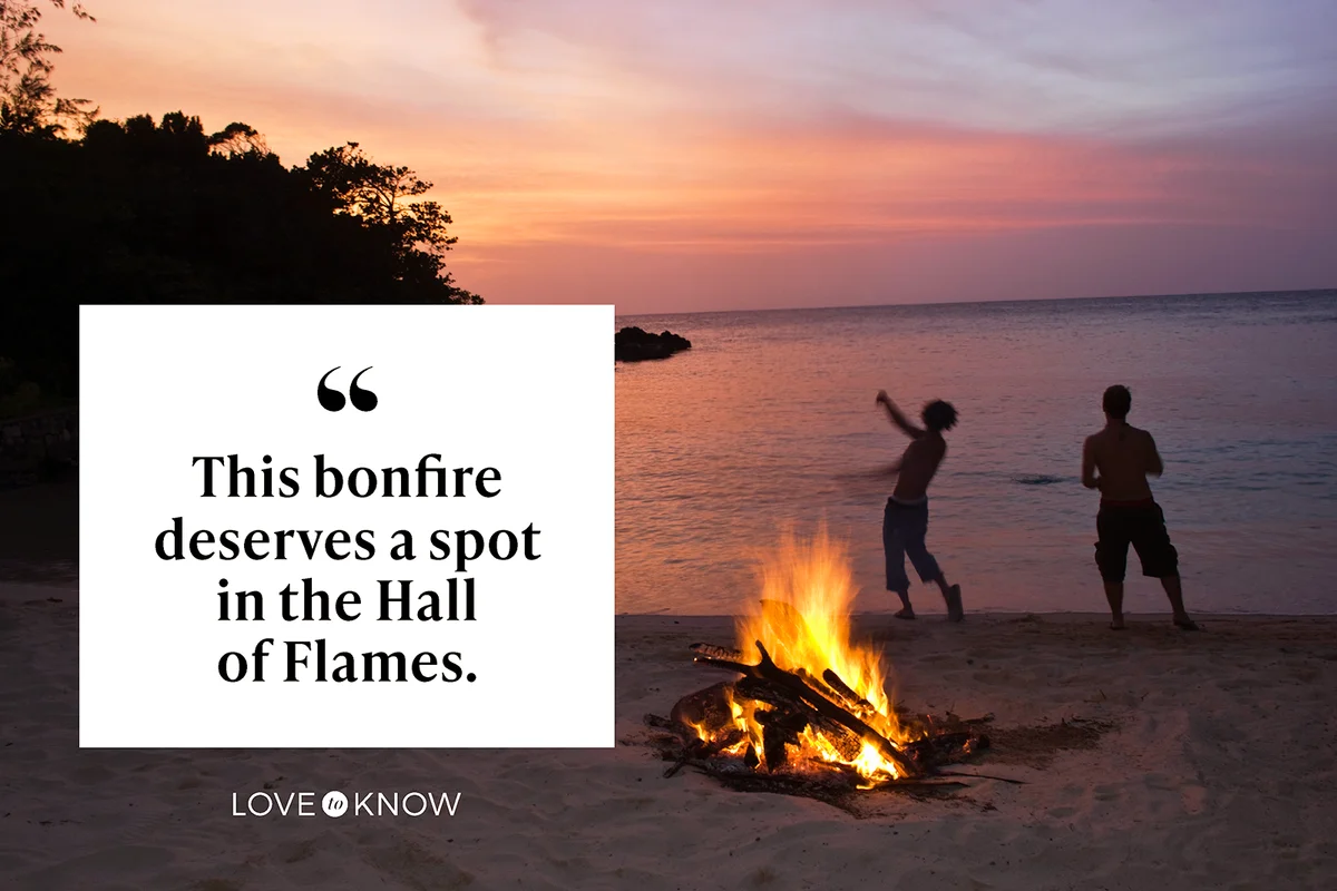Beach bonfire and silhouetted people