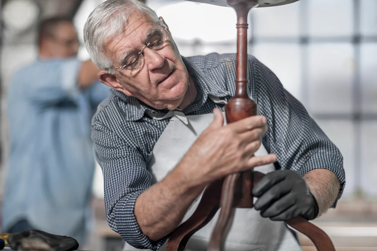 Man inspecting a table
