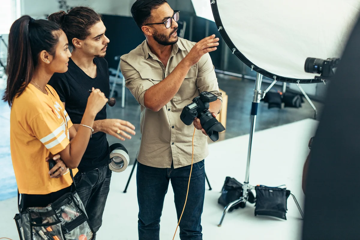Photographer working with his team during a photo shoot