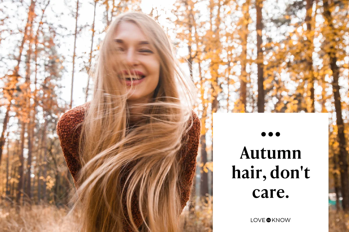 Woman with long blond hair having fun in autumnal park