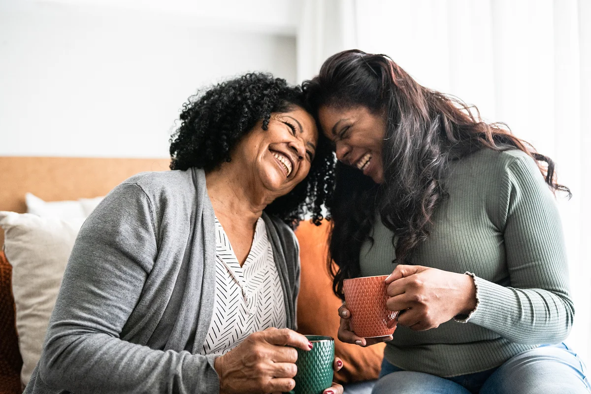 Bonding moment between mother and daughter at home