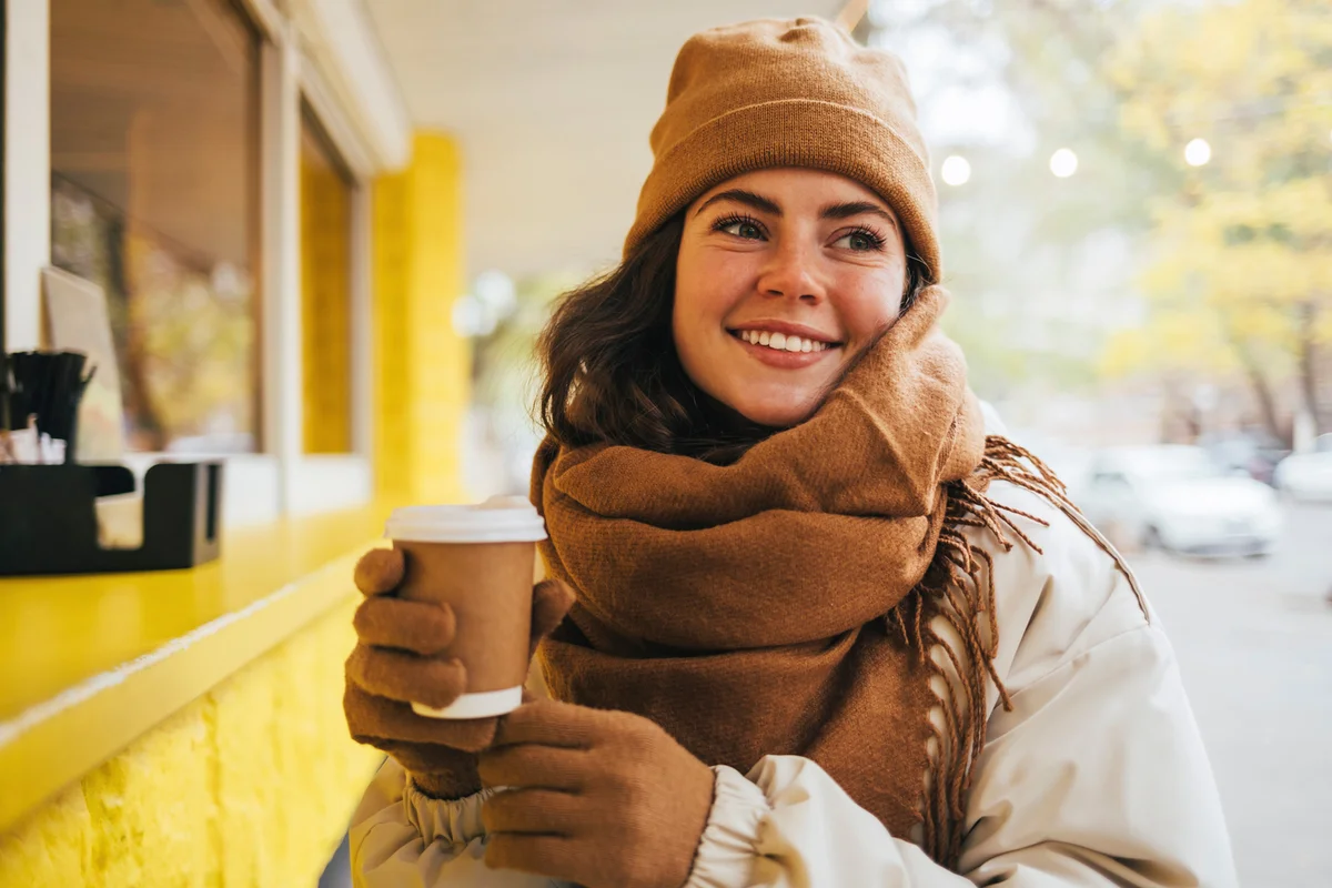 woman in autumn brown scarf and hat