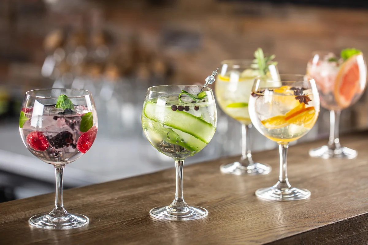 Gin tonic long drink as a classic cocktail in various forms