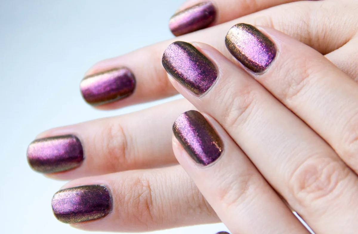 purple duochrome nails close up