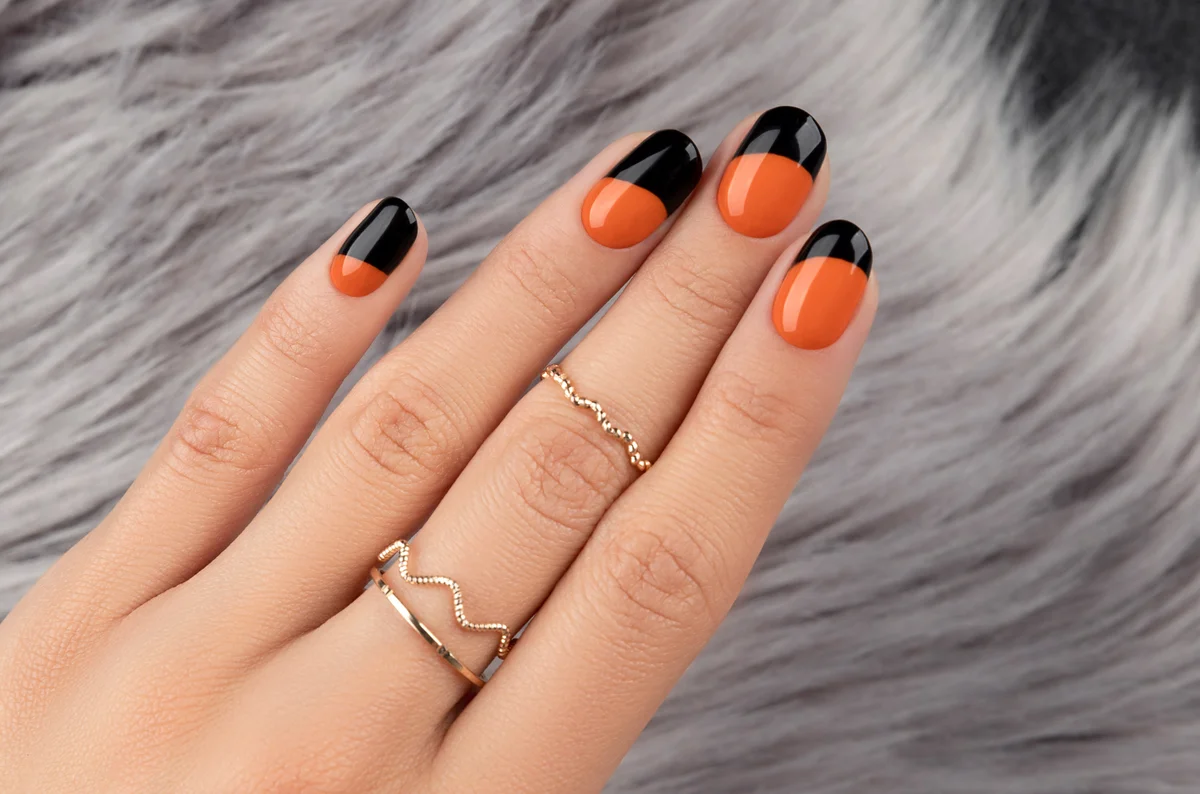 Halloween black and orange manicure closeup