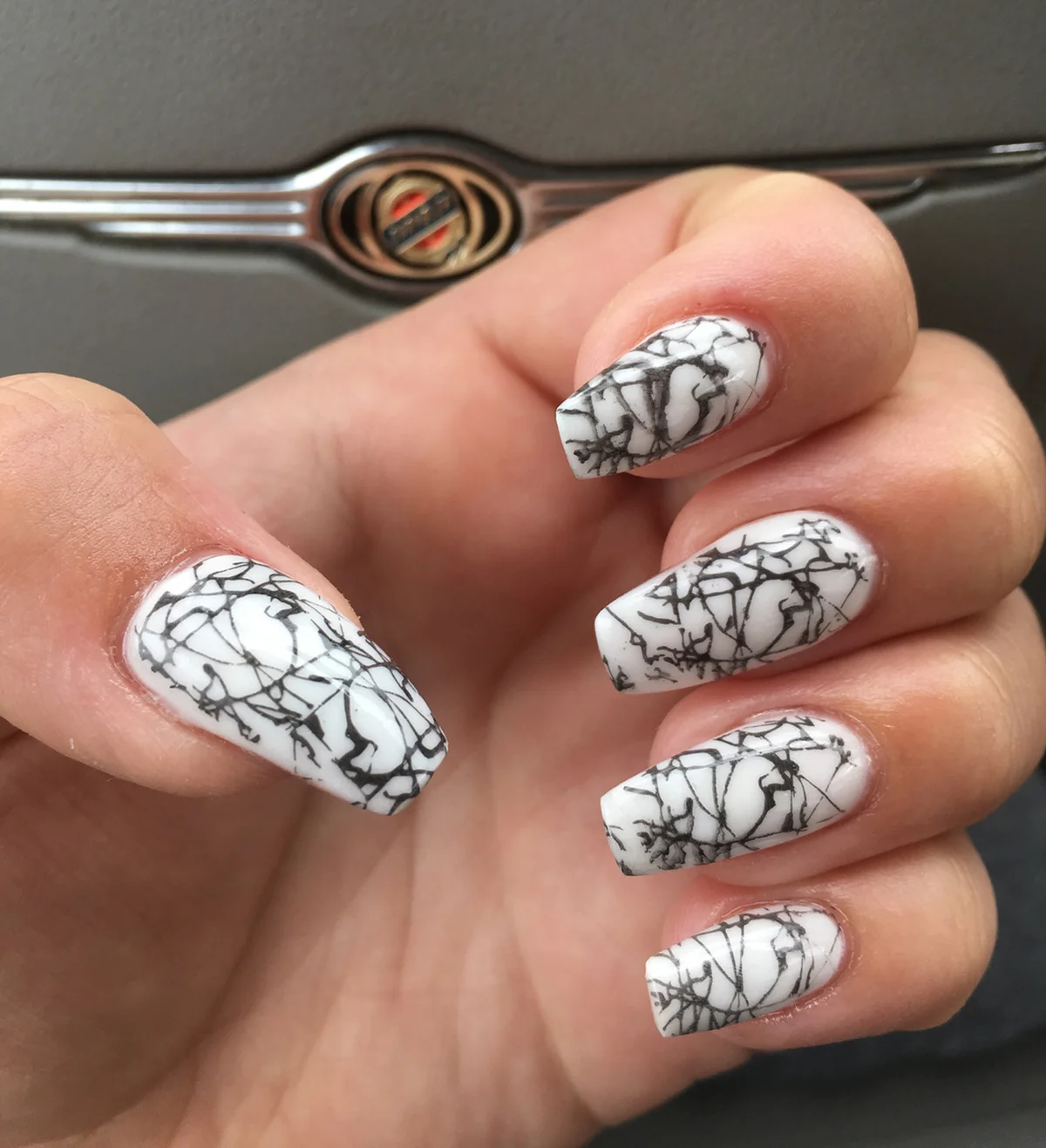 cracked white and black manicure