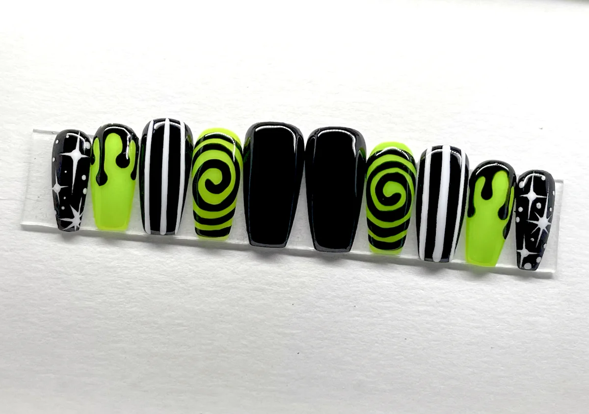 Slime green and black nail art