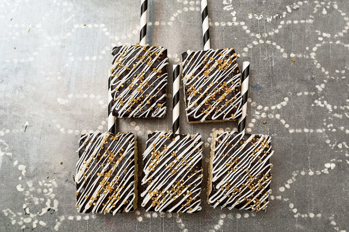 Black and white rice crispy treat pops