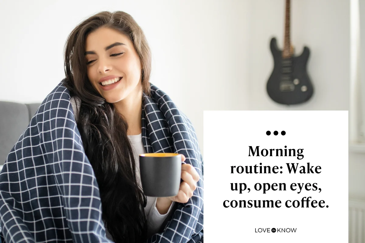 Beautiful young woman drinking coffee in bed at the morning
