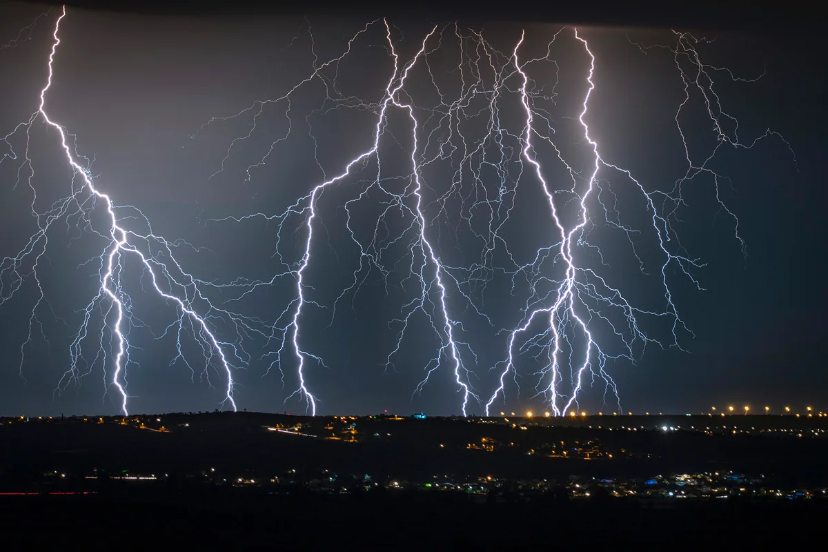 Low angle view of lightning in sky at night