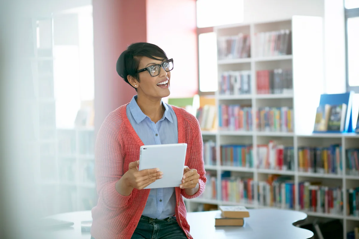 Librarian holding a tablet