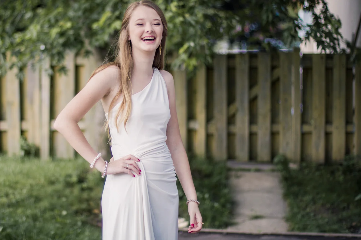 Portrait of a beautiful girl with long straight blonde hair