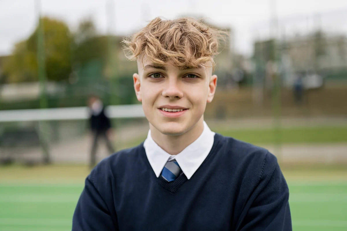 portrait of teenage schoolboy in uniform