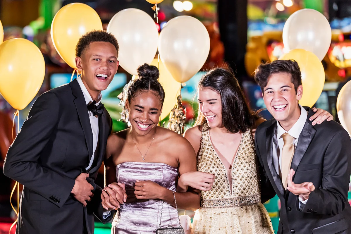 Teenagers having fun at homecoming dance