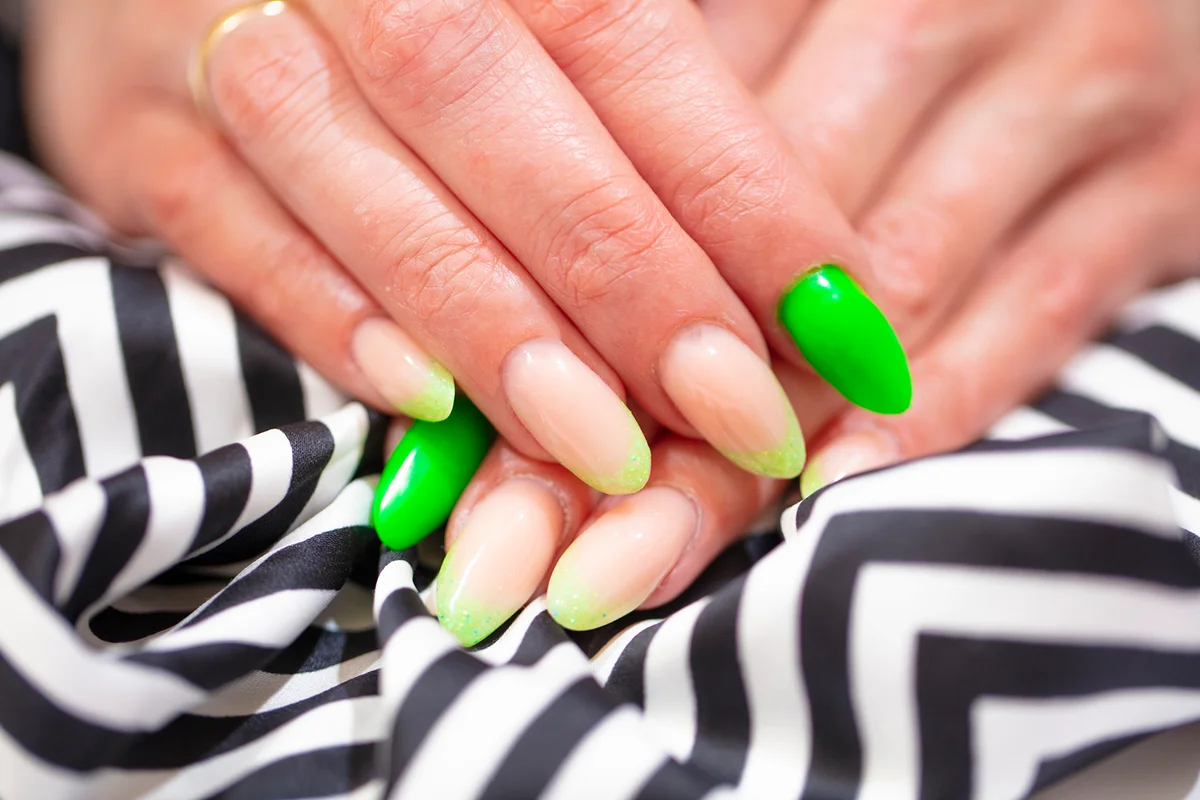 Woman Fingers With Nail Art Manicure with neon colour