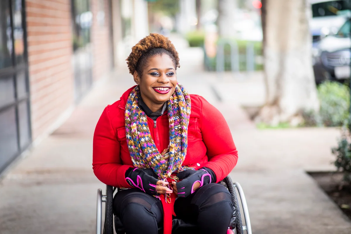 Portrait of a Young Woman in a Wheelchair
