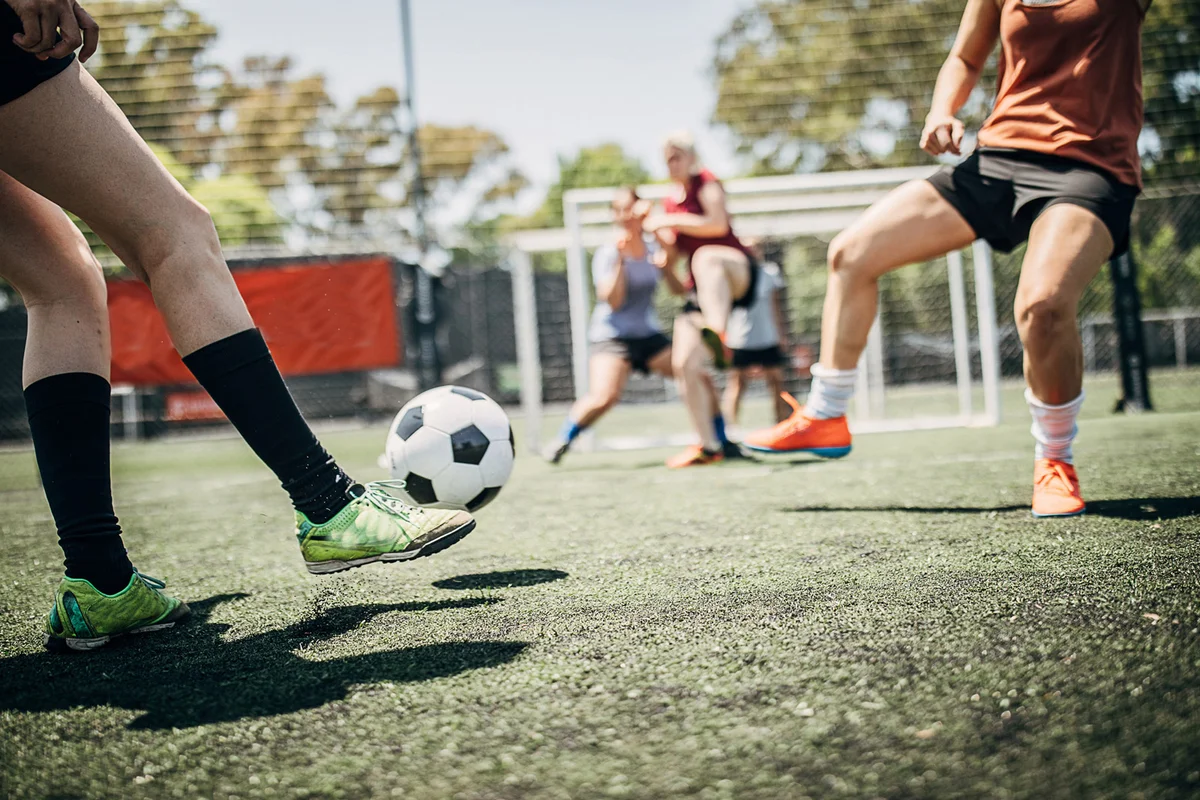 Women playing soccer
