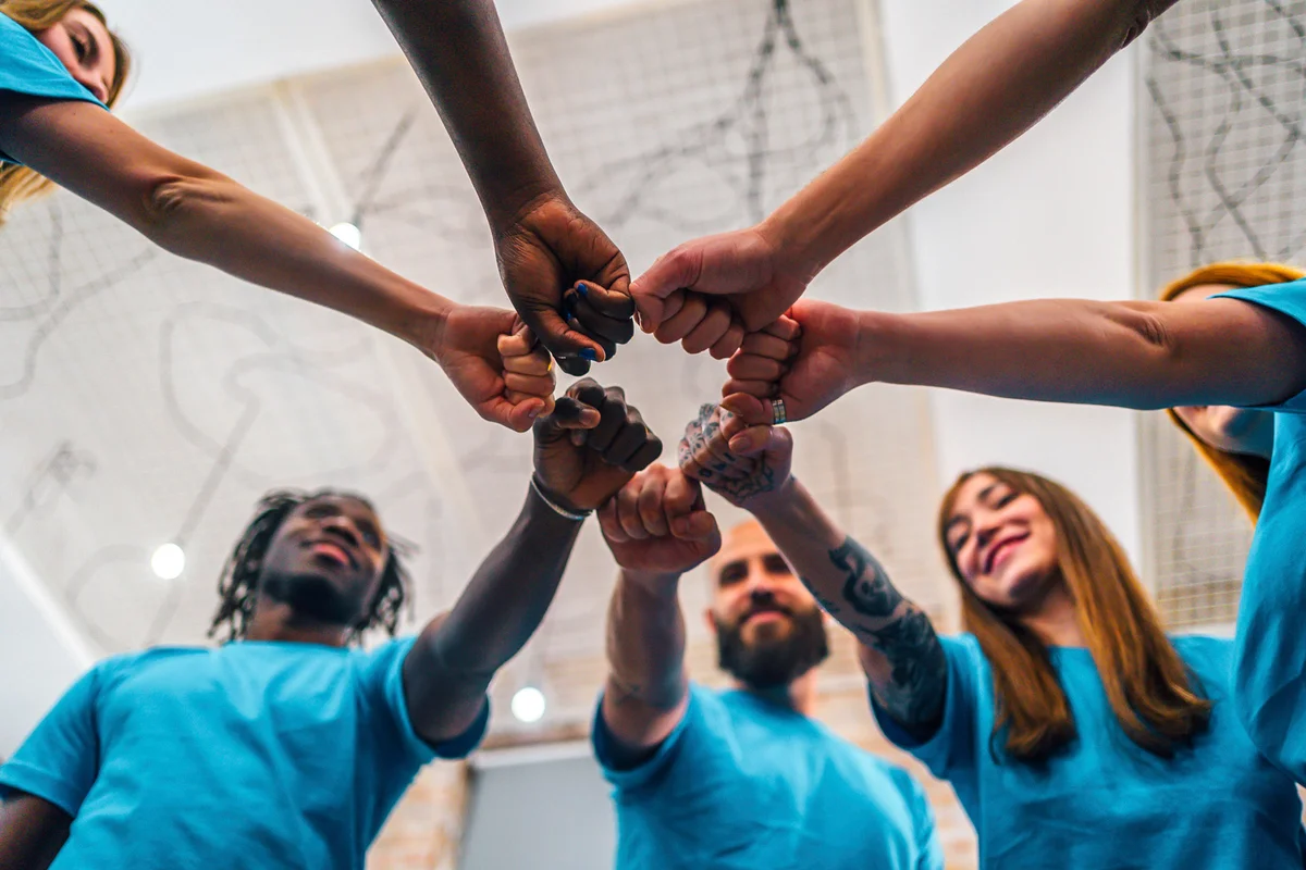 Volunteers in a huddle