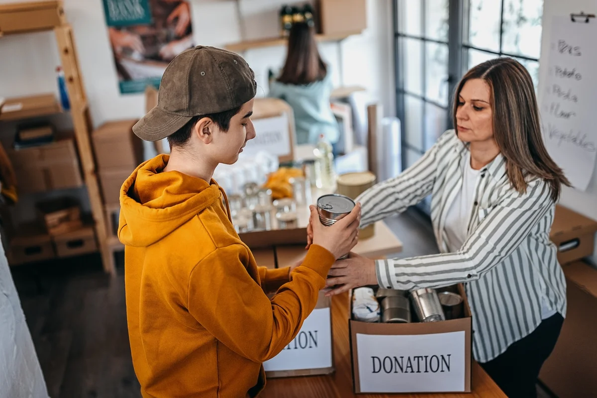 teen volunteering at food bank
