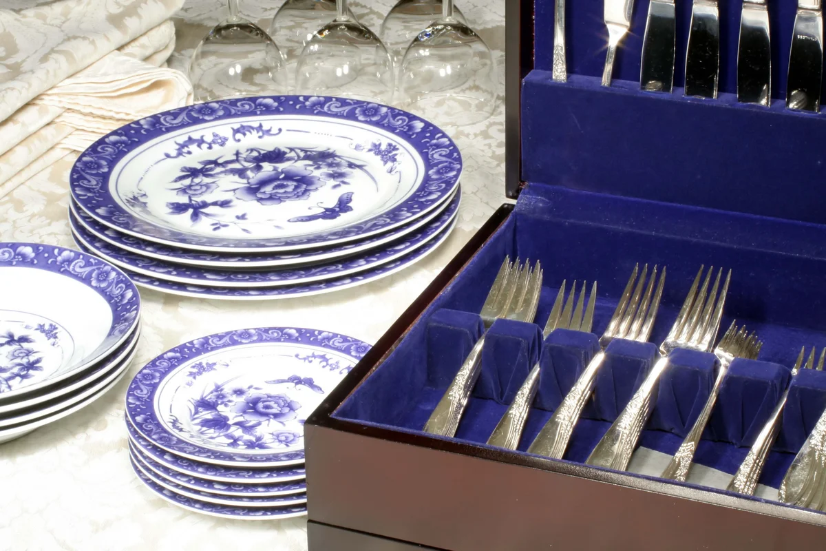 sterling flatware and old dishes