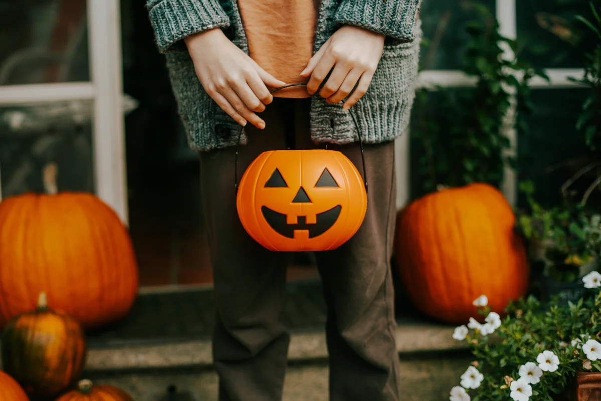 Boy holding a halloween basket