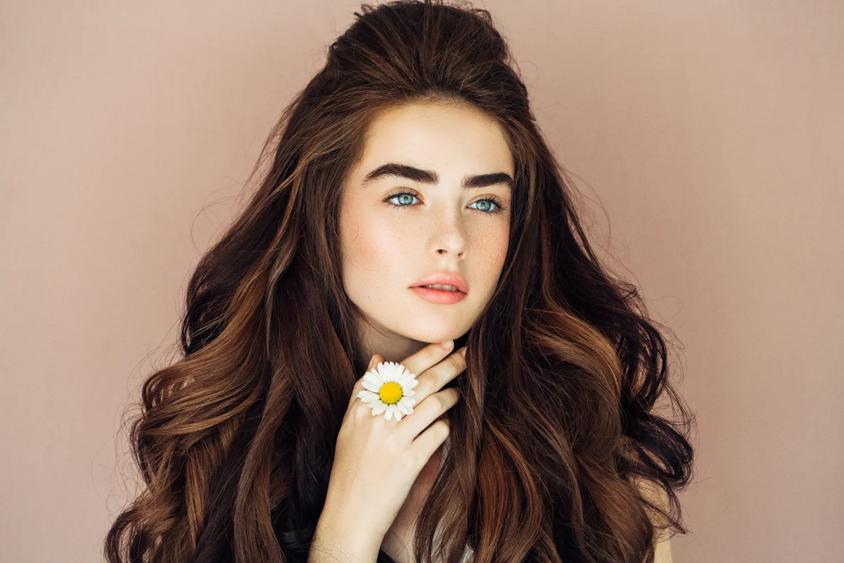 Studio shot of young beautiful woman