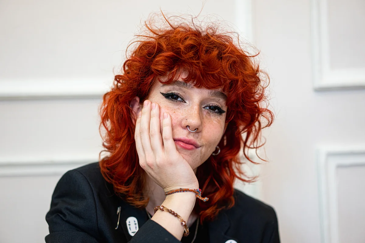 Young beautiful candid red woman with freckles