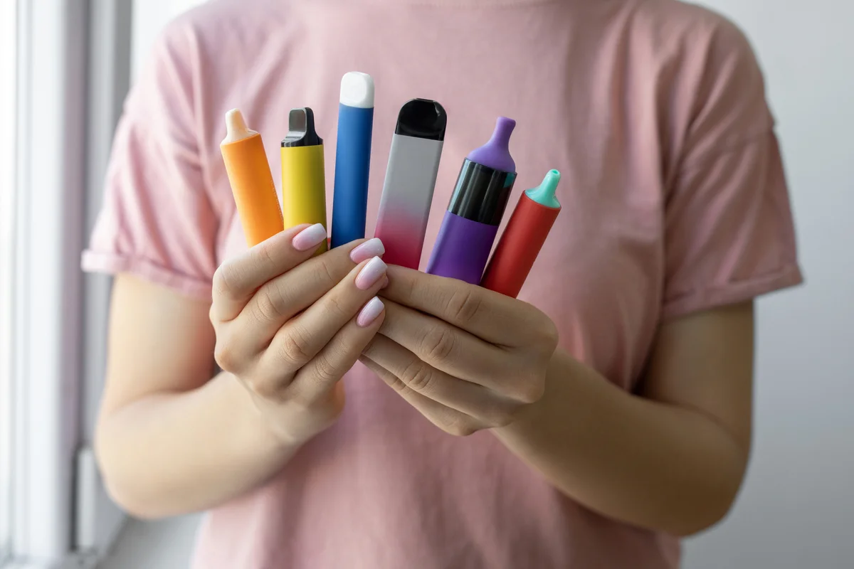 Vape cigarettes in woman hand
