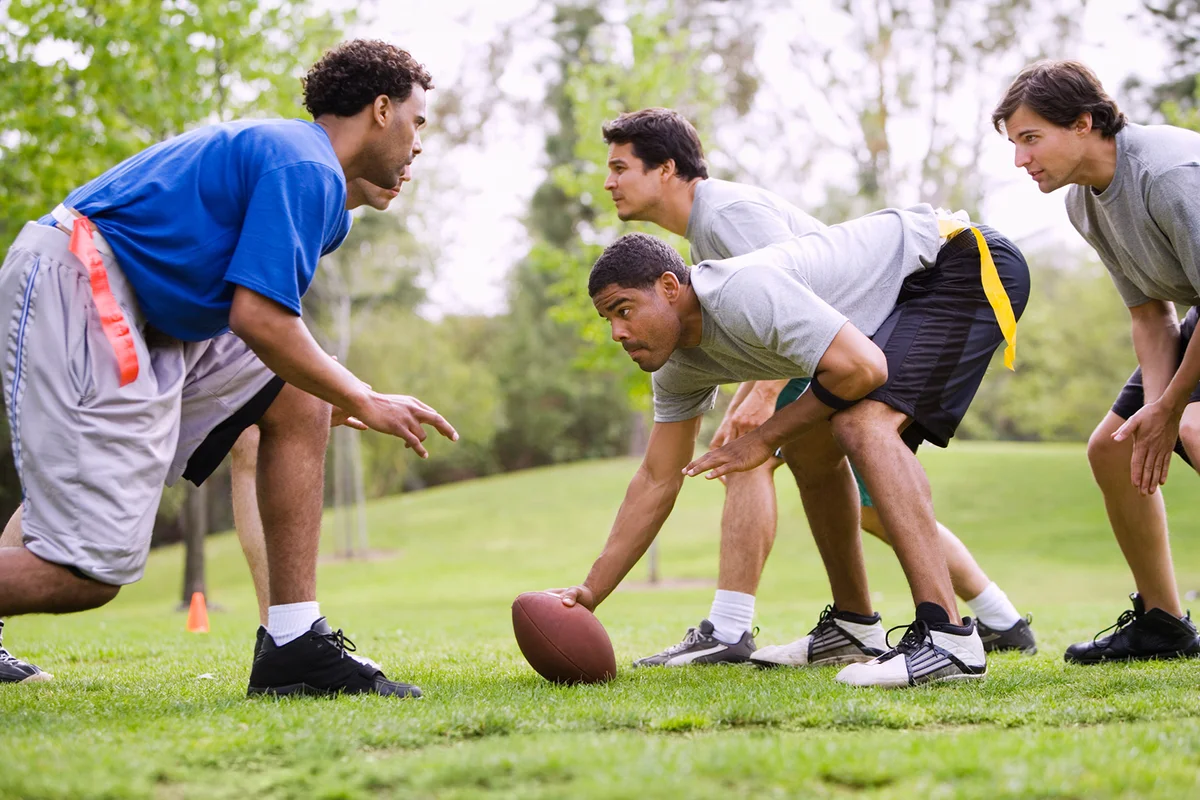 Men playing flag football