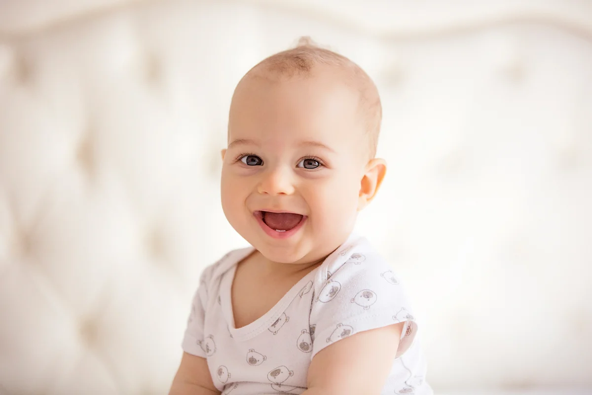 Portrait of joyful baby boy