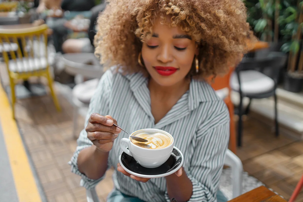 woman drinking coffee