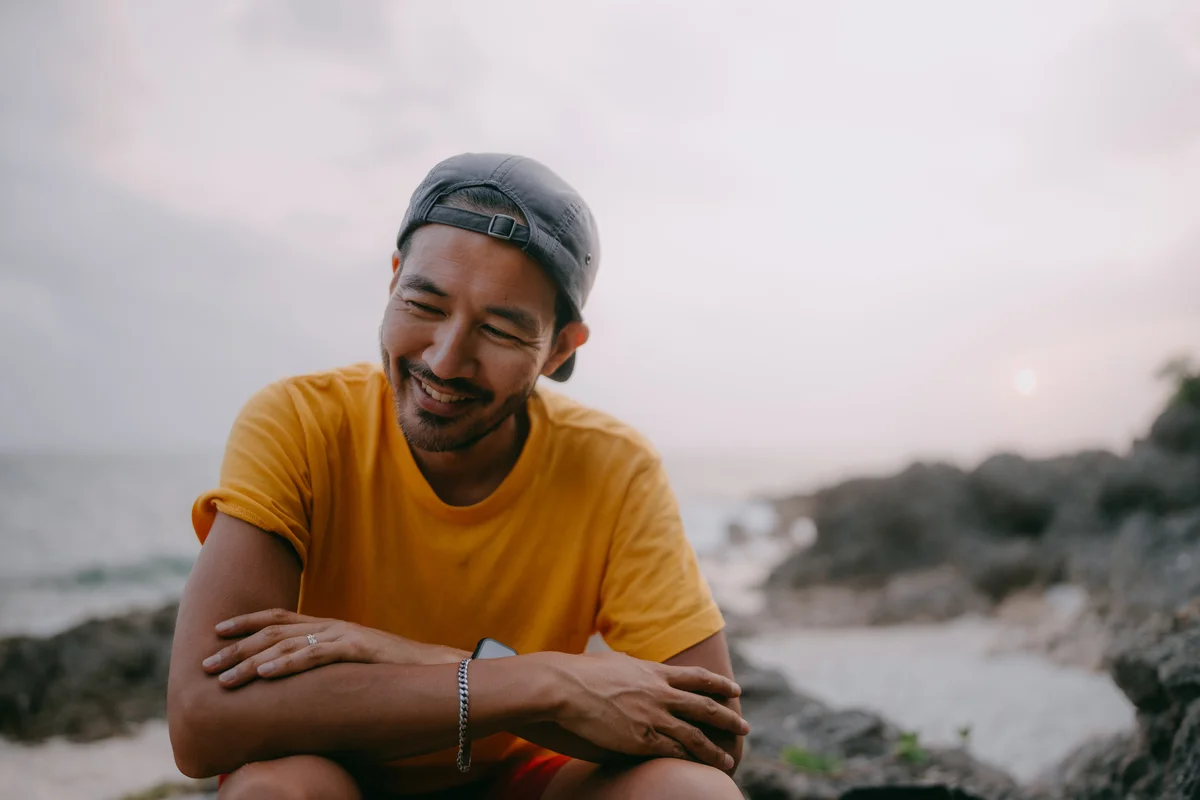 Man smiling at the beach