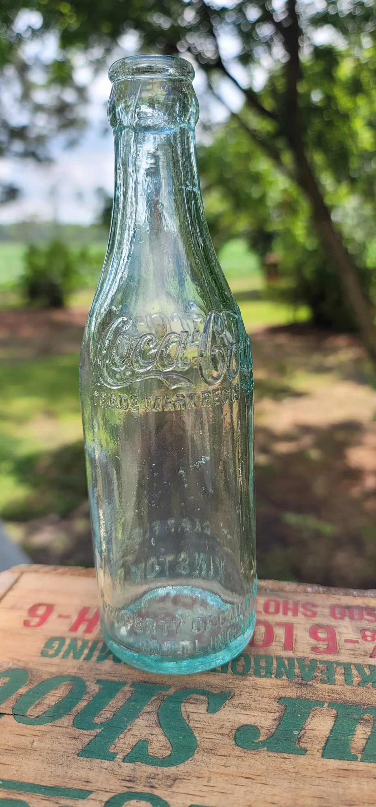 Vintage straight-sided coca-cola bottle