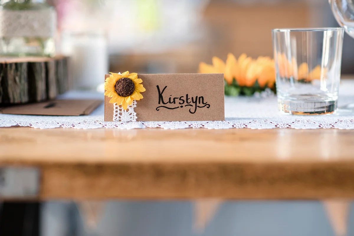 name tag on dining table at wedding reception