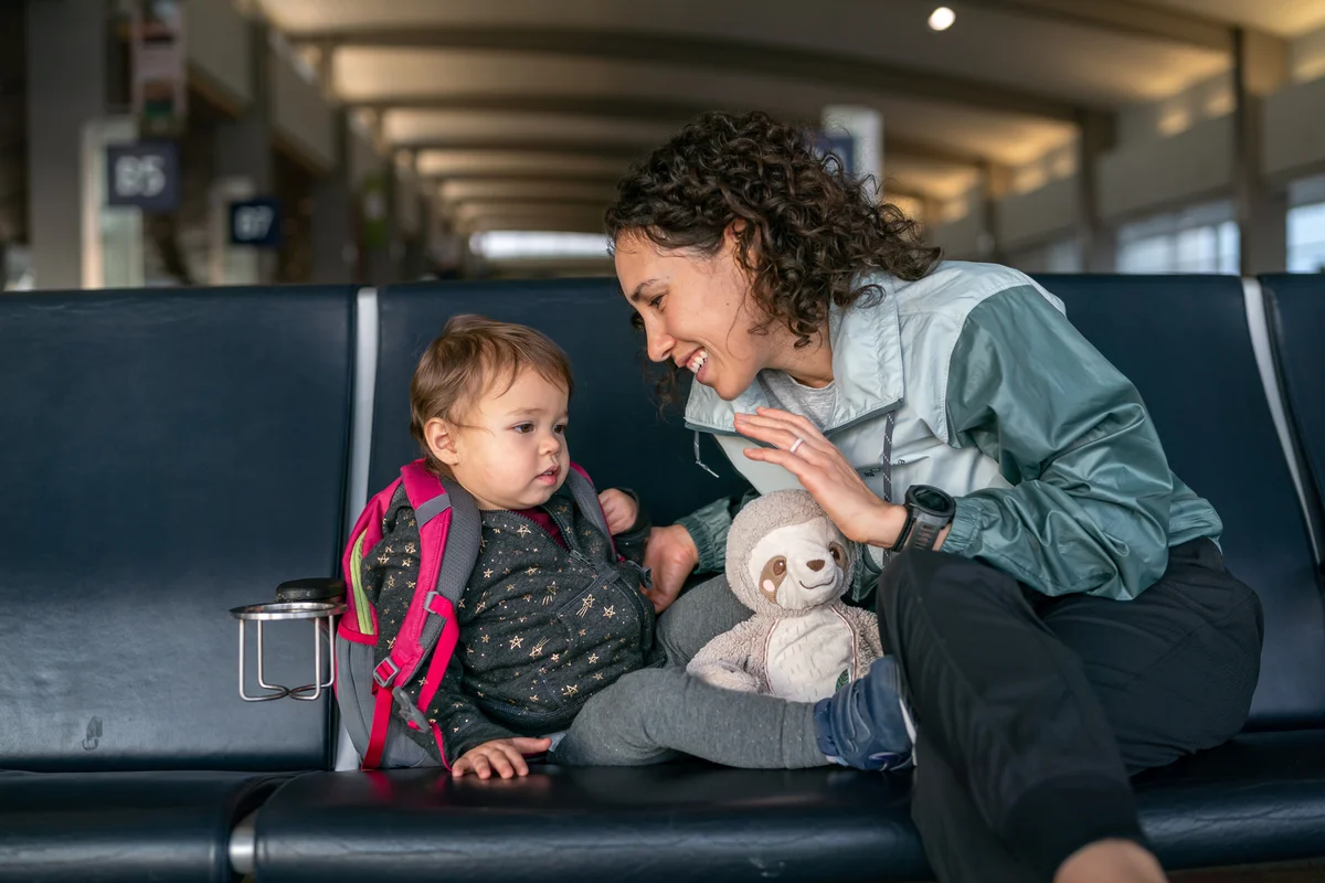 toddler and mom at airport